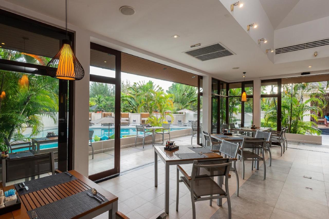 Dewa Phuket Resort & Villas Nai Yang Beach Exterior foto The restaurant at the hotel
