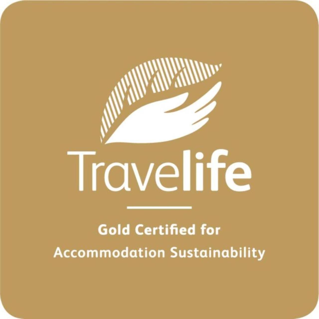 Dewa Phuket Resort & Villas Nai Yang Beach Exterior foto Travelife Gold logo